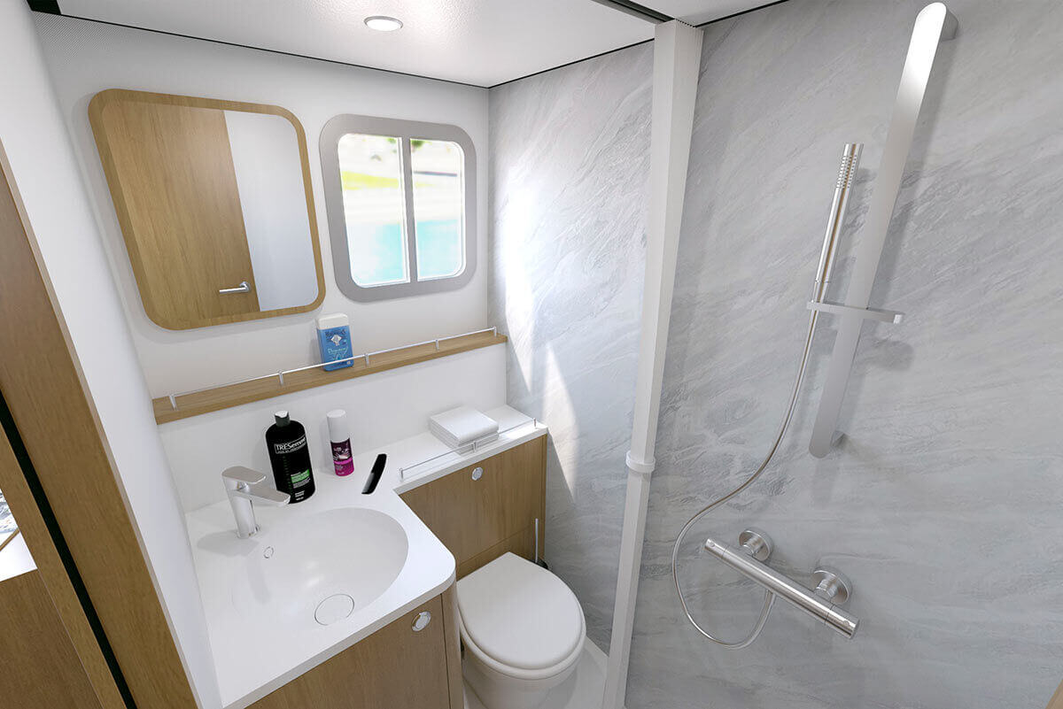 Nasszelle mit Dusche, Waschbecken und elektrischem WC